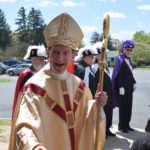 Bishop Burbidge greets parishioners after Mass.