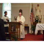 Fr. Cregan incensing the Gospel